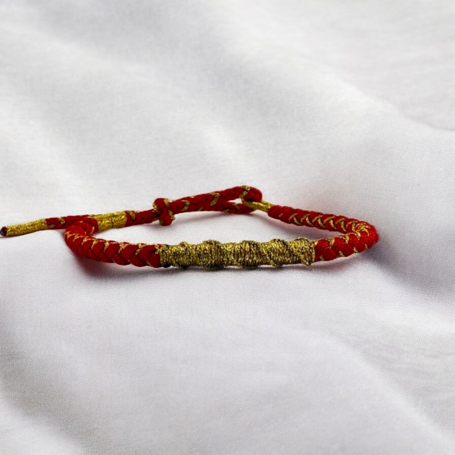 red and gold woven bracelet