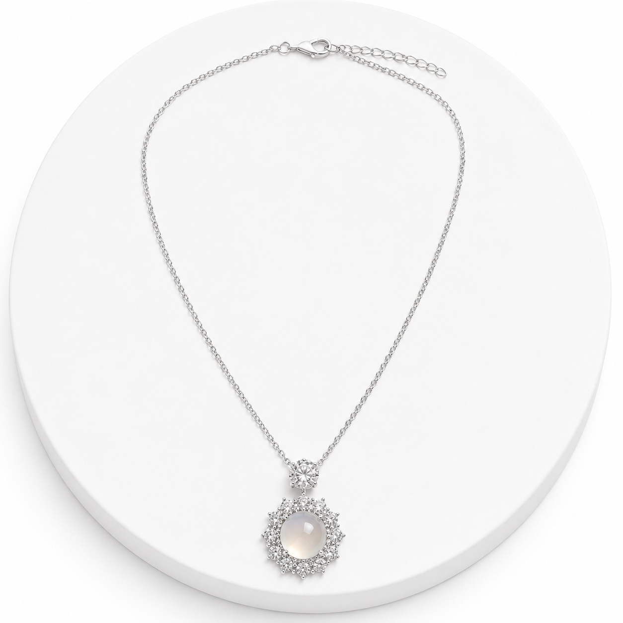 Silver necklace with a pendant on a white background