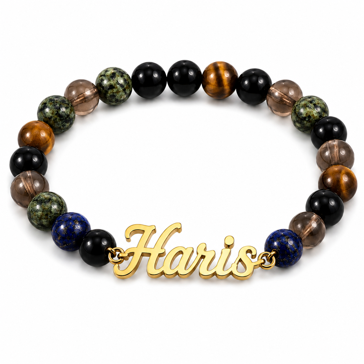 Multicolored beaded bracelet with a gold 'Harris' charm on a white background