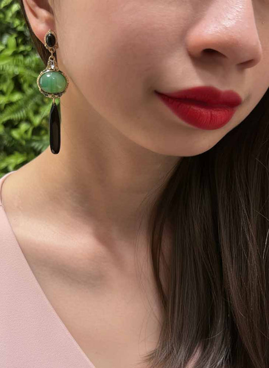 Emerald Eclipse Earrings – Where Power Meets Poise