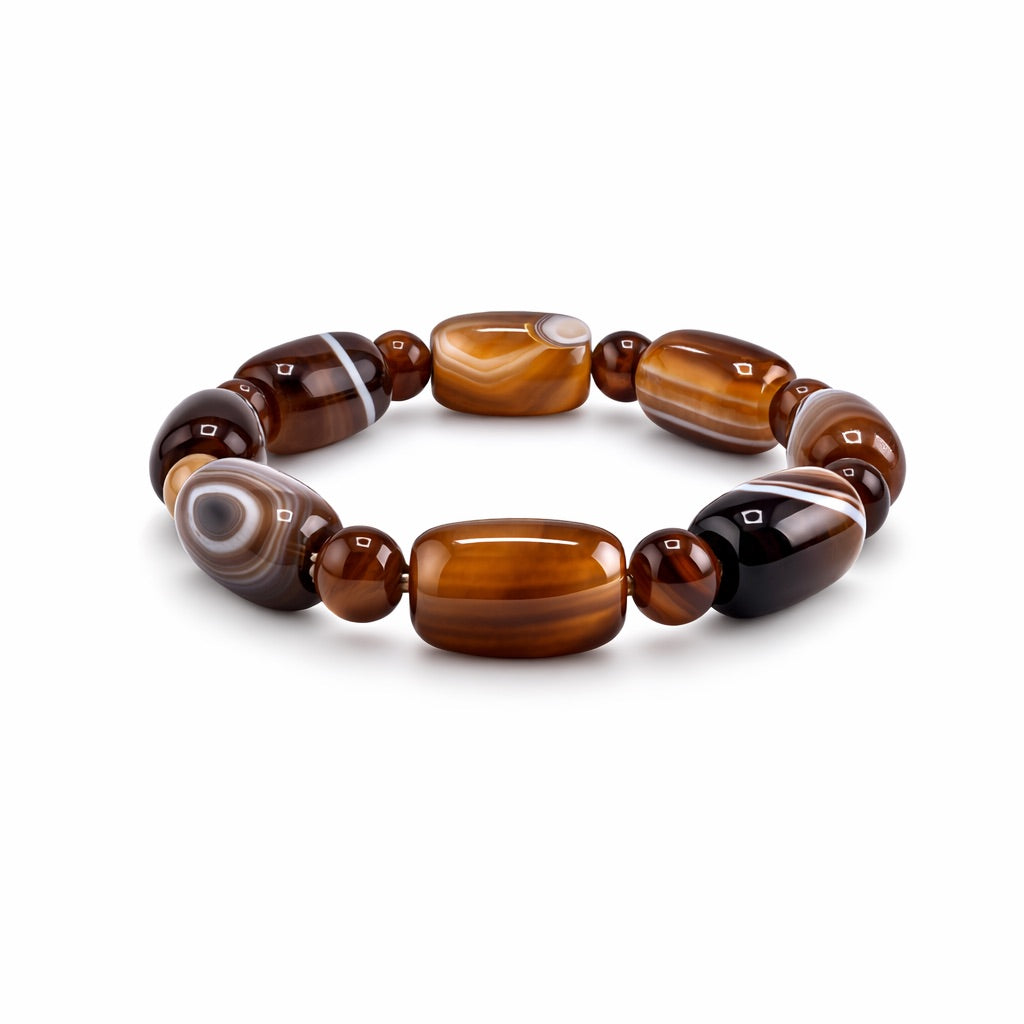 Brown beaded bracelet on a white background