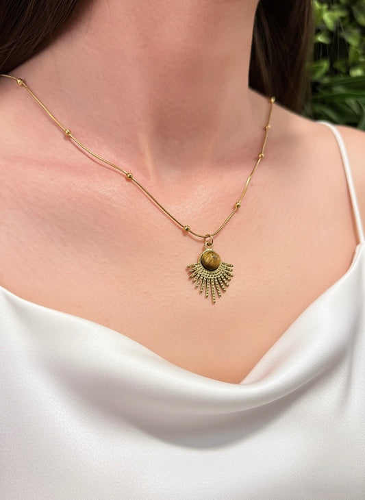 gold plated tiger eye sunburst pendant necklace on model