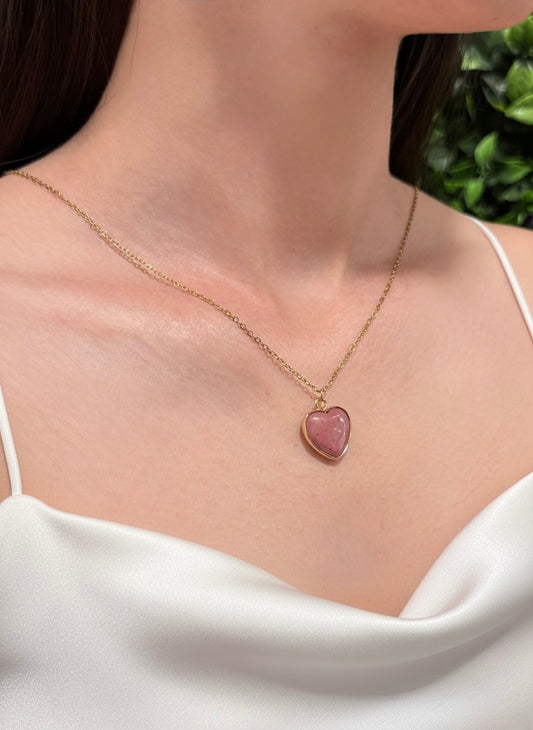 pink rhodonite heart pendant close up