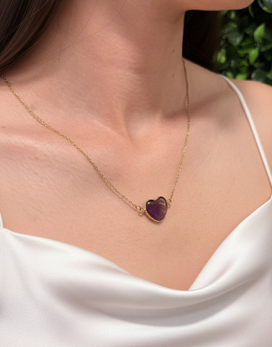 gold plated amethyst pendant close up