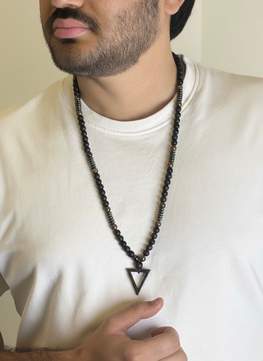 Black Matte Onyx Triangle Pendant Necklace on white shirt
