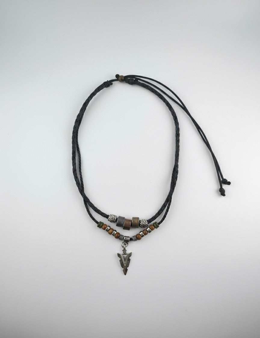 Tribal arrow necklace detailed product flatlay