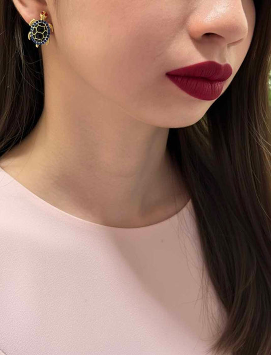 Lapis Lazuli Turtle Stud Earrings – deep blue lapis stones set in golden turtle studs.