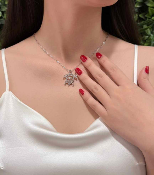 Silver Turtle Pendant Necklace – elegant women’s sea turtle necklace in shimmering silver.