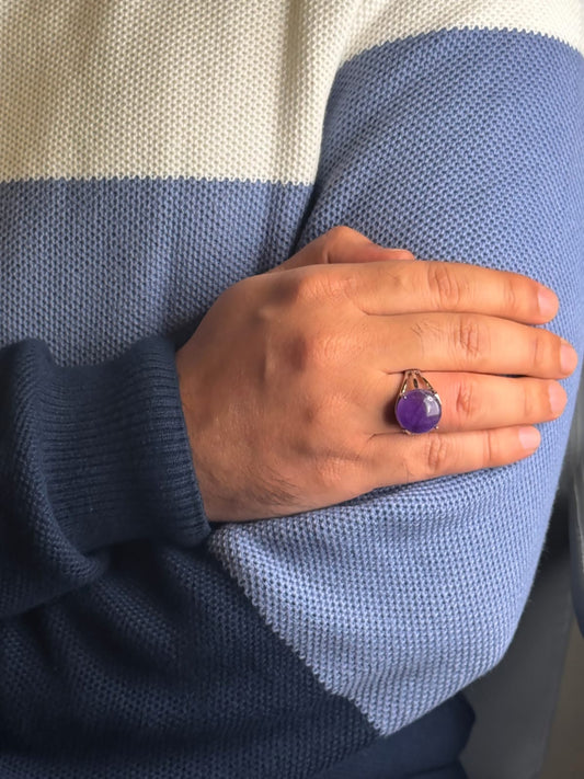 Close up of Amethyst stone ring on a man’s hand