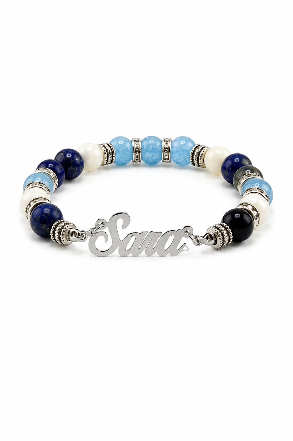 Bracelet with blue and black beads and a silver nameplate on a white background