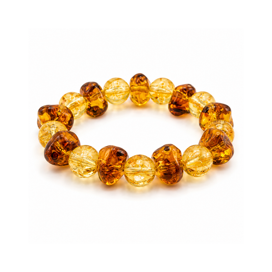 Beaded bracelet with amber-colored beads on a white background