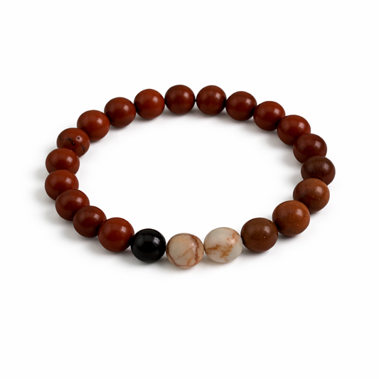Bracelet with brown, black, and beige beads on a white background