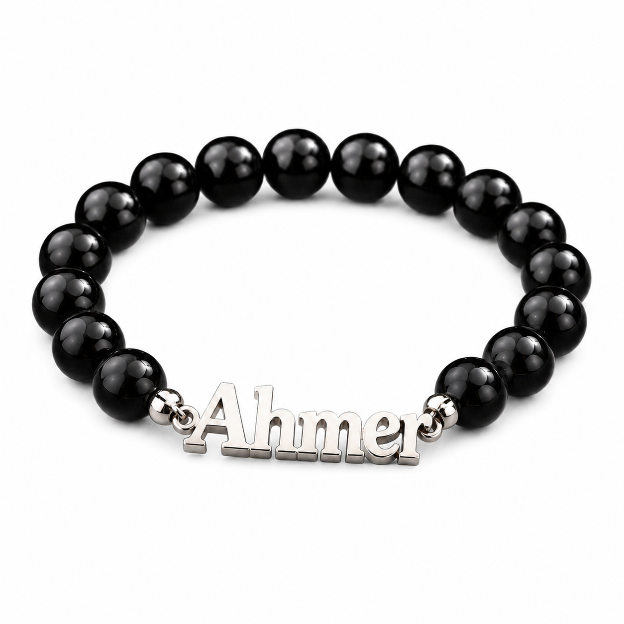 Black beaded bracelet with a silver 'Ahmer' charm on a white background