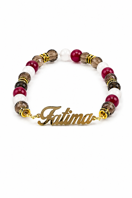 Bracelet with multicolored beads and a gold 'Fatima' charm on a white background