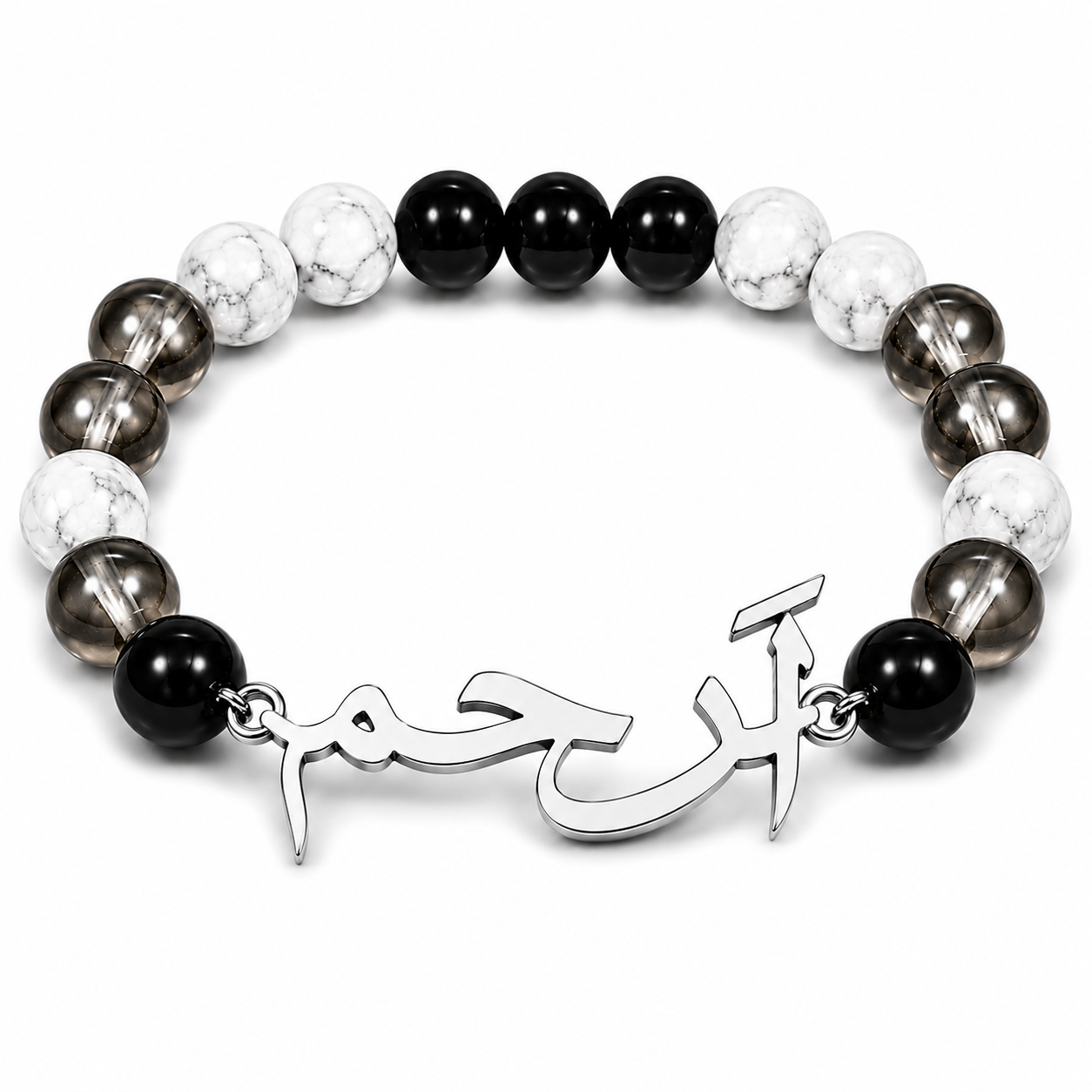 Bracelet with black, white, and gray beads and silver Arabic calligraphy charm on a white background