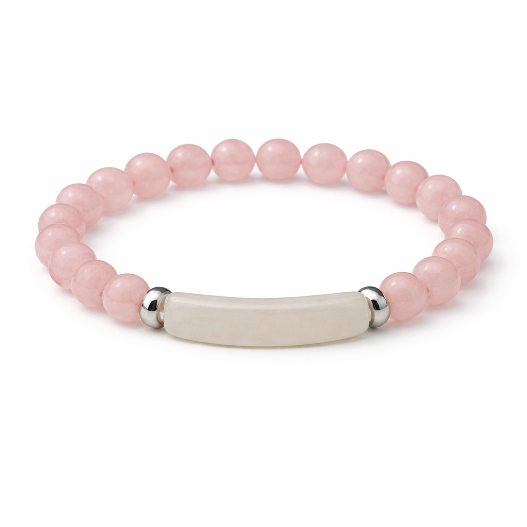 Pink beaded bracelet with a silver and beige bar clasp on a white background
