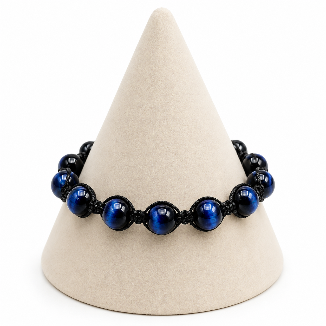 Blue beaded bracelet on a white cone-shaped stand