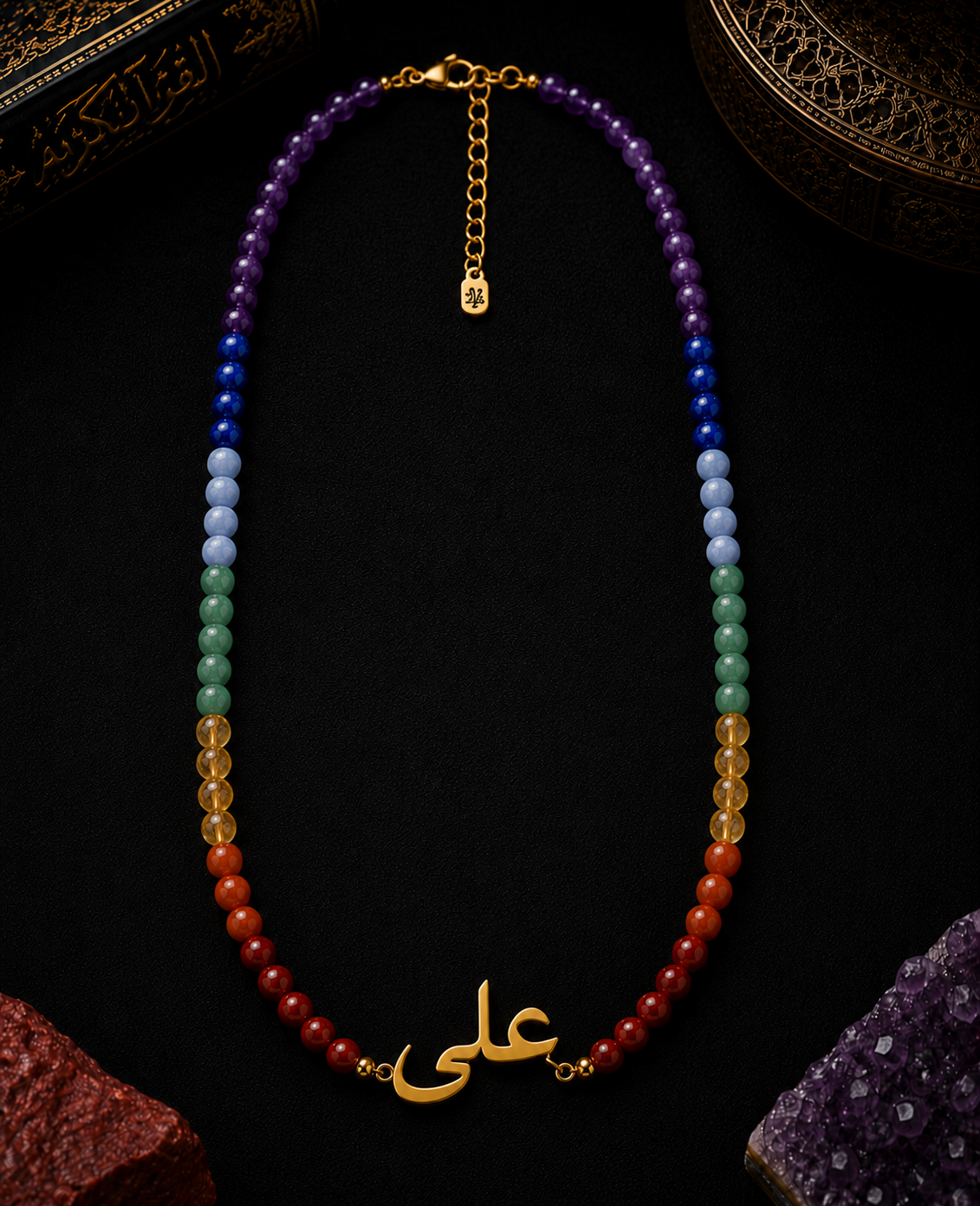 Colorful beaded necklace with gold clasp on a dark background