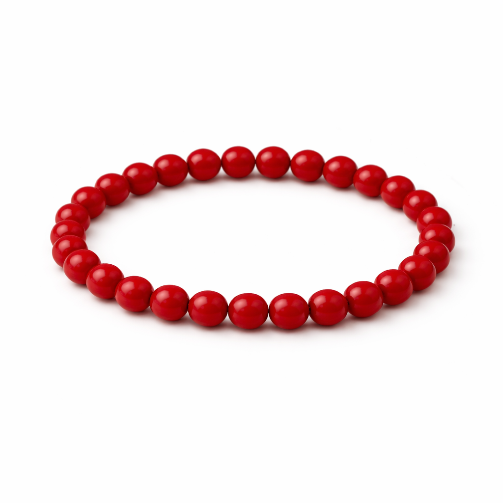 Red beaded bracelet on a white background