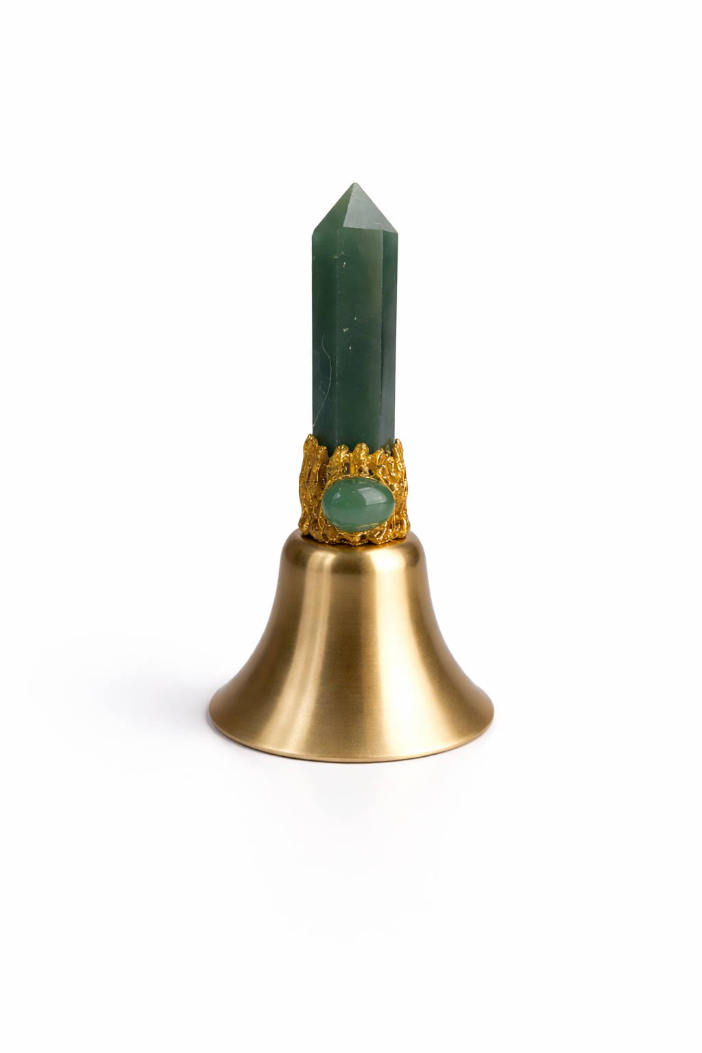 Brass bell with green stone on a white background