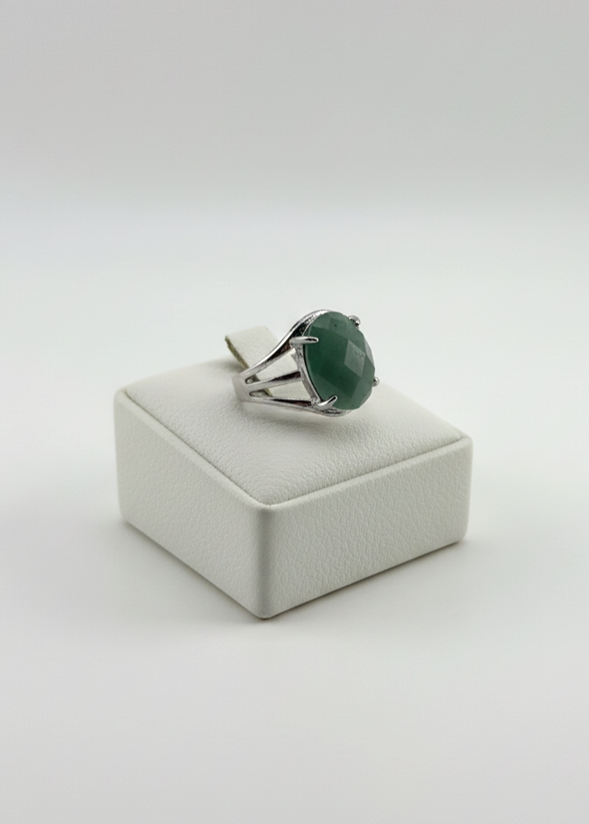Natural Amazonite stone ring shown on prop in soft lighting
