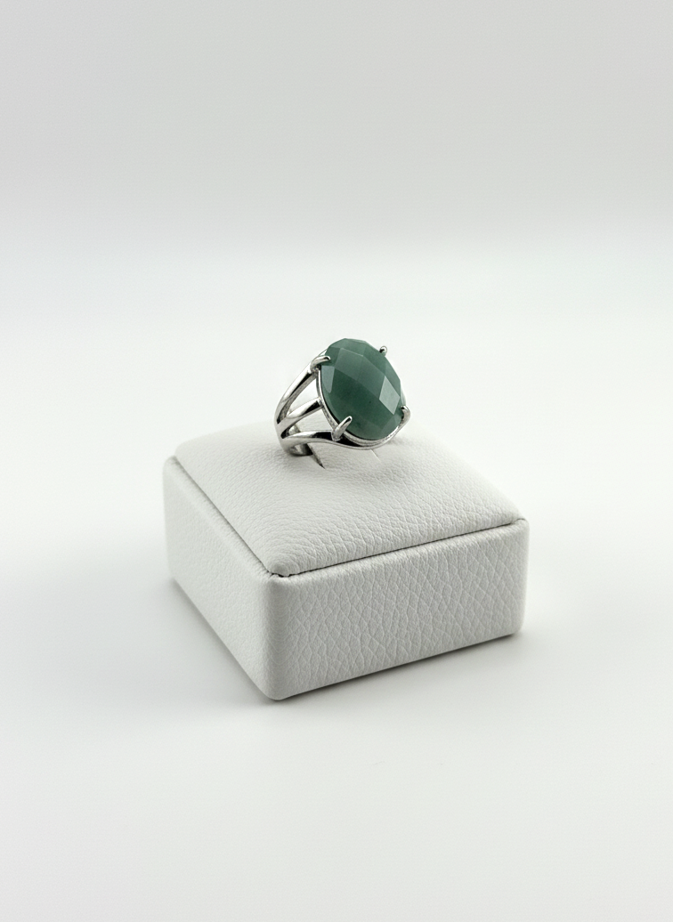 Natural Amazonite stone ring shown on prop in soft lighting