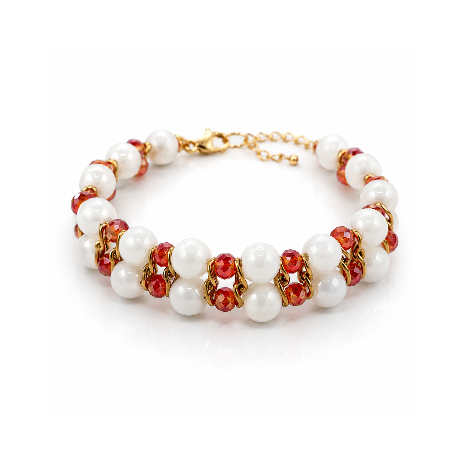 Bracelet with white pearls, red stones, and gold accents on a white background