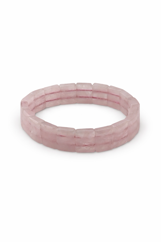 Pink beaded bracelet on a white background