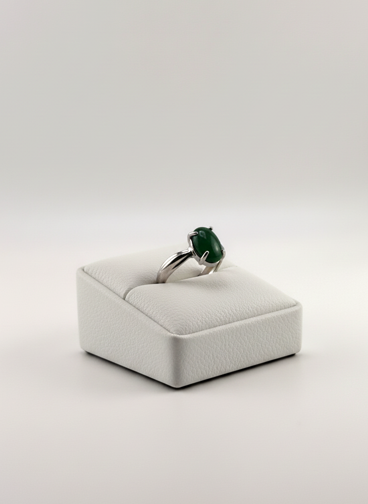 Natural Green Aventurine stone ring shown on prop in light