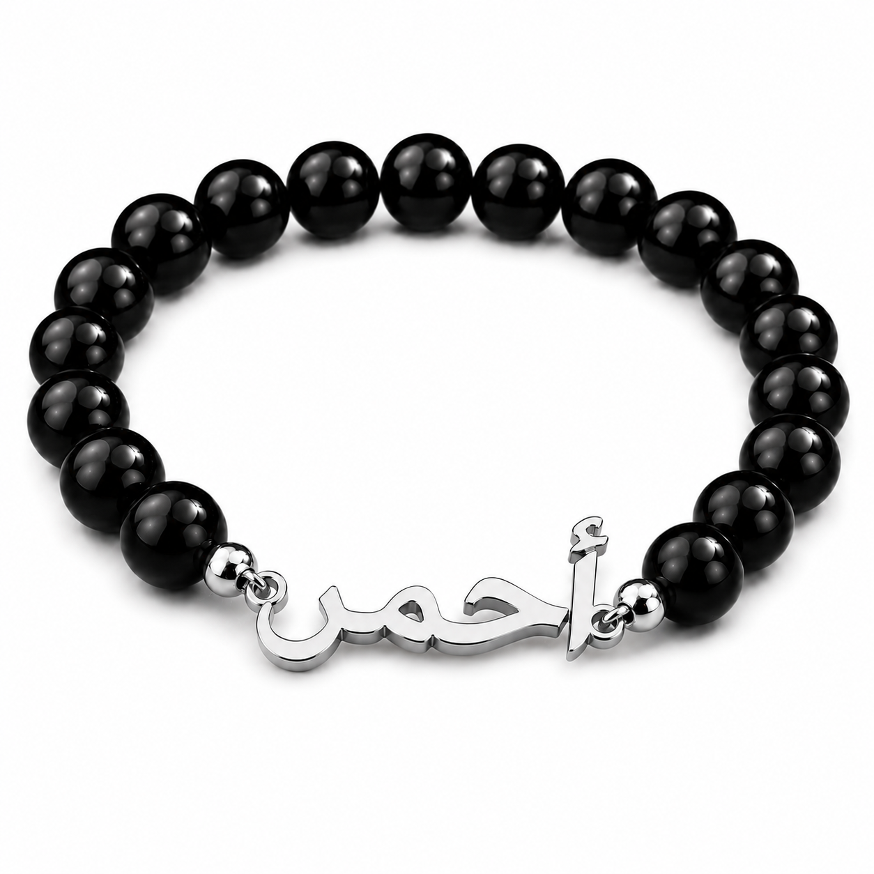 Black beaded bracelet with silver clasp on a white background