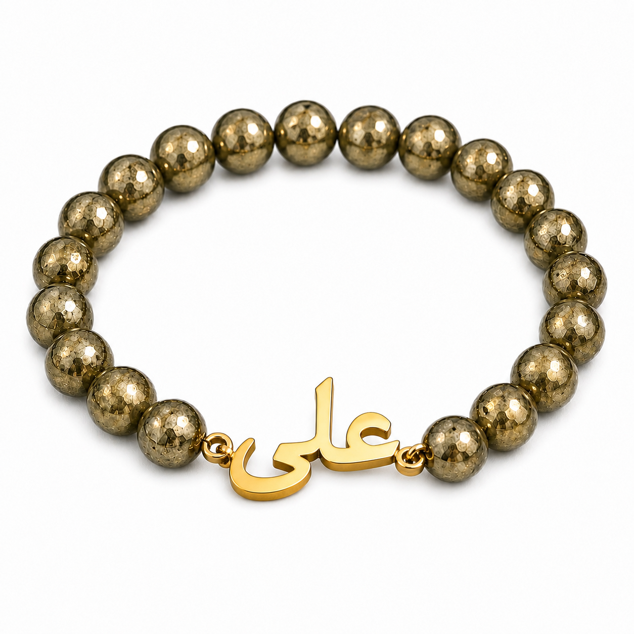 Gold beaded bracelet with a gold charm on a white background