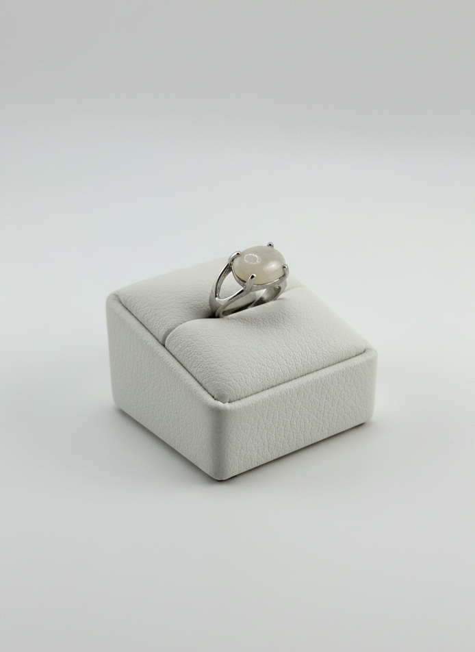 Natural White Agate stone ring displayed on prop
