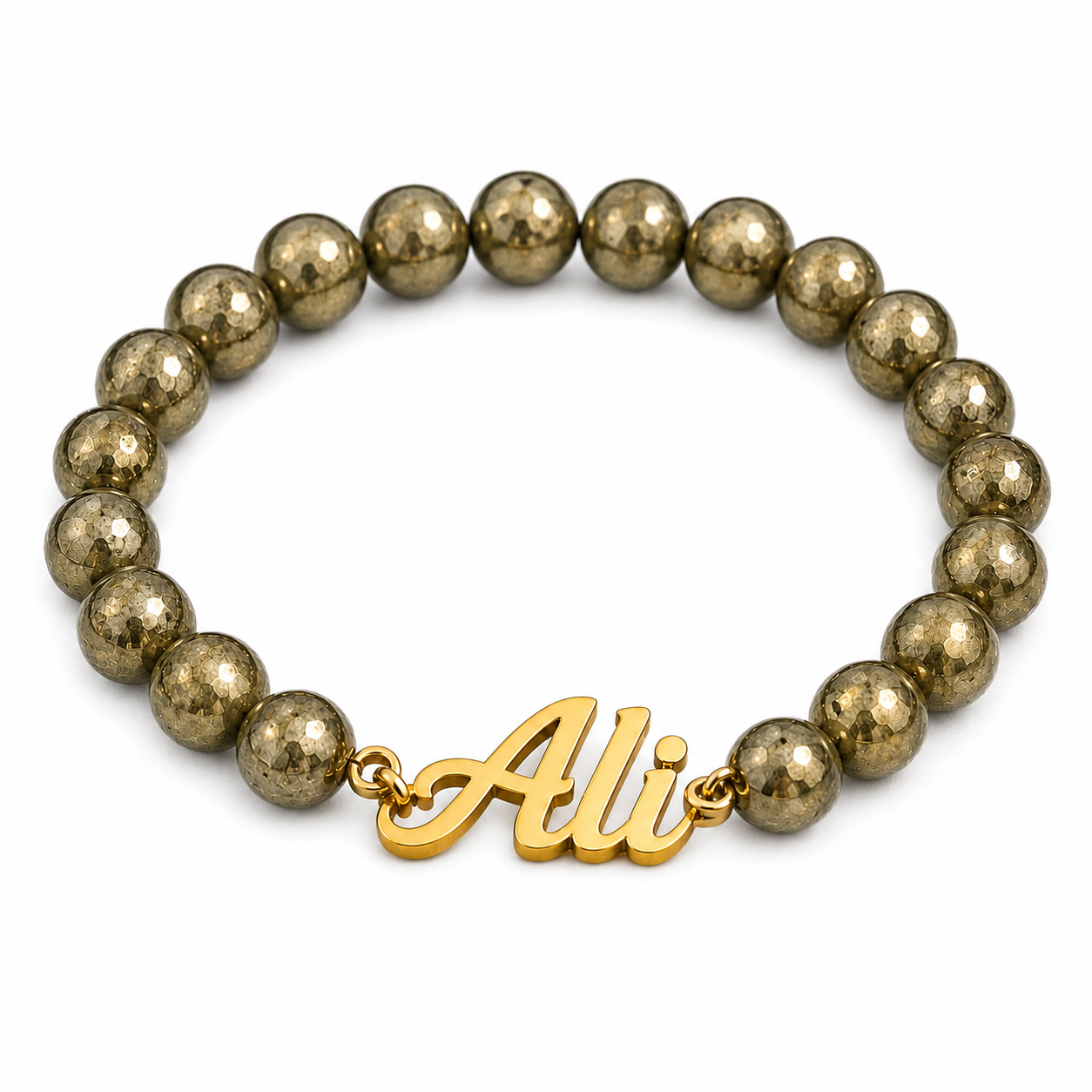 Bracelet with gold beads and a gold 'Ali' charm on a white background