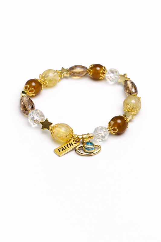 Beaded bracelet with 'FAITH' charm on a white background