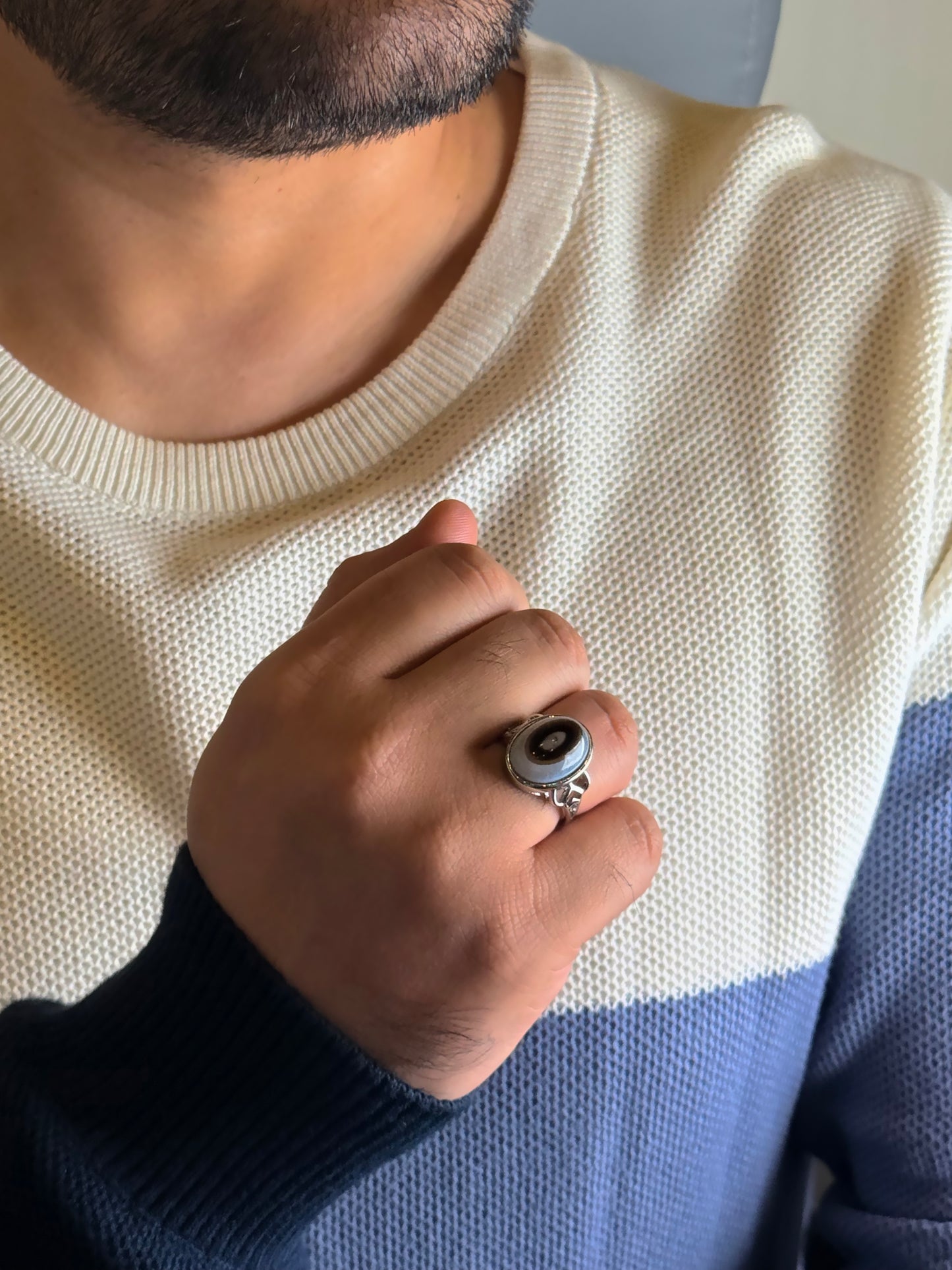 Man wearing Black Agate male ring in silver finish