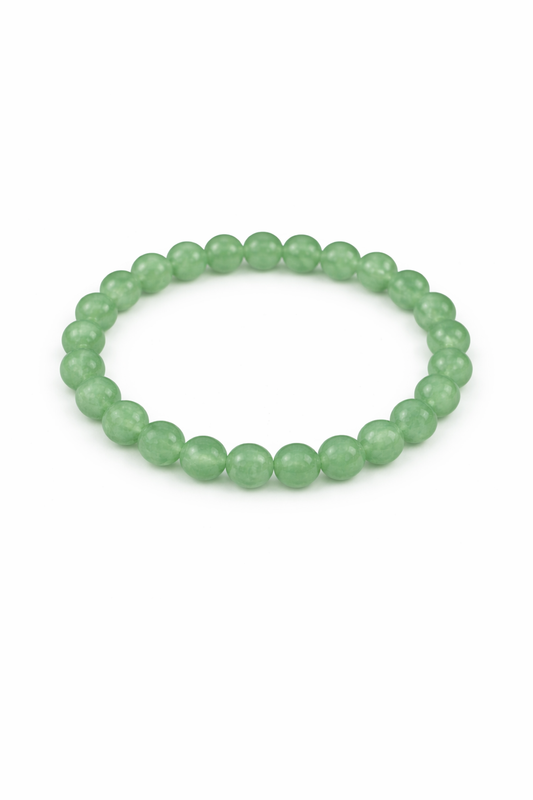 Green beaded bracelet on a white background