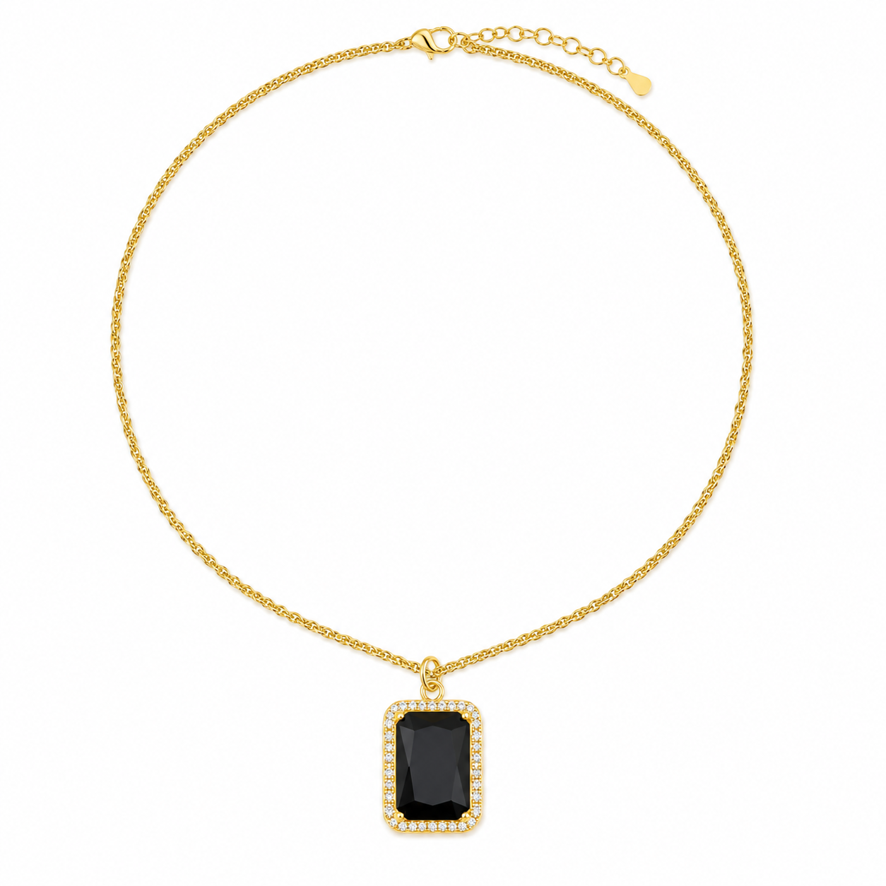 Gold necklace with a black pendant on a white background
