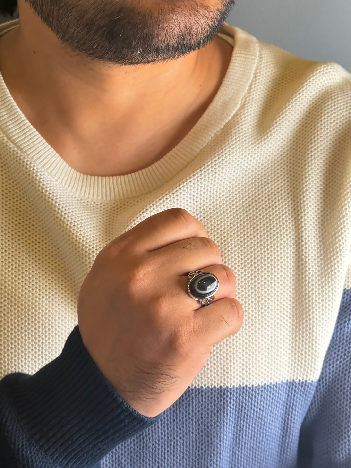 Man wearing Black Onyx male ring in silver finish