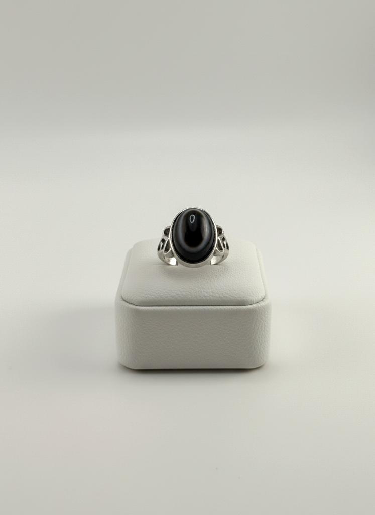 Polished Black Onyx stone ring shown on prop