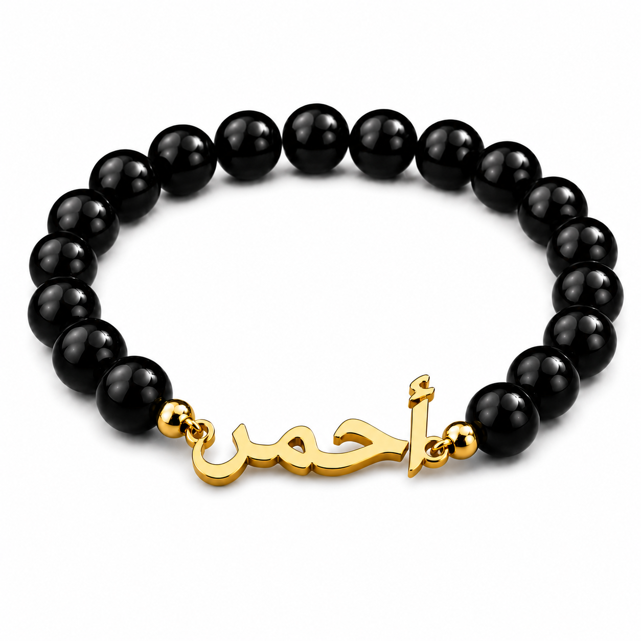 Black beaded bracelet with gold clasp on a white background