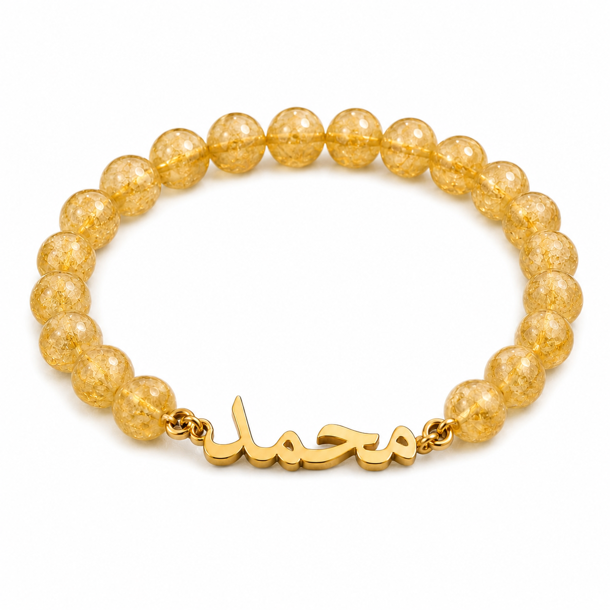 Gold beaded bracelet with a gold clasp on a white background