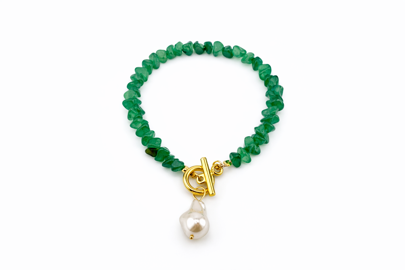 Green beaded bracelet with a gold clasp and pearl charm on a white background
