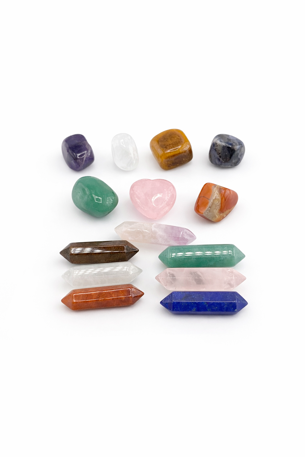 Collection of various crystal points on a white background