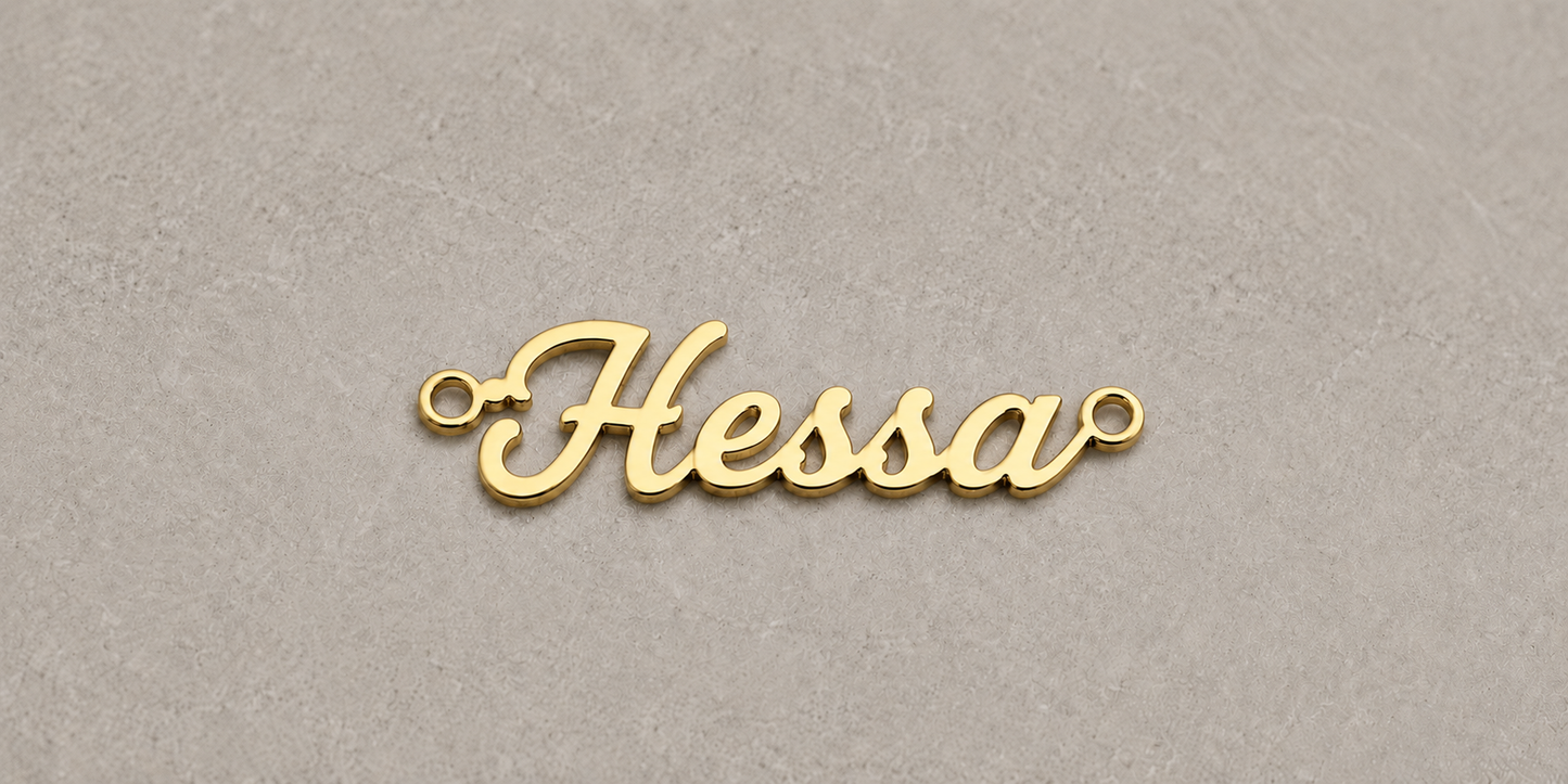 Gold 'Hessa' nameplate on a gray background