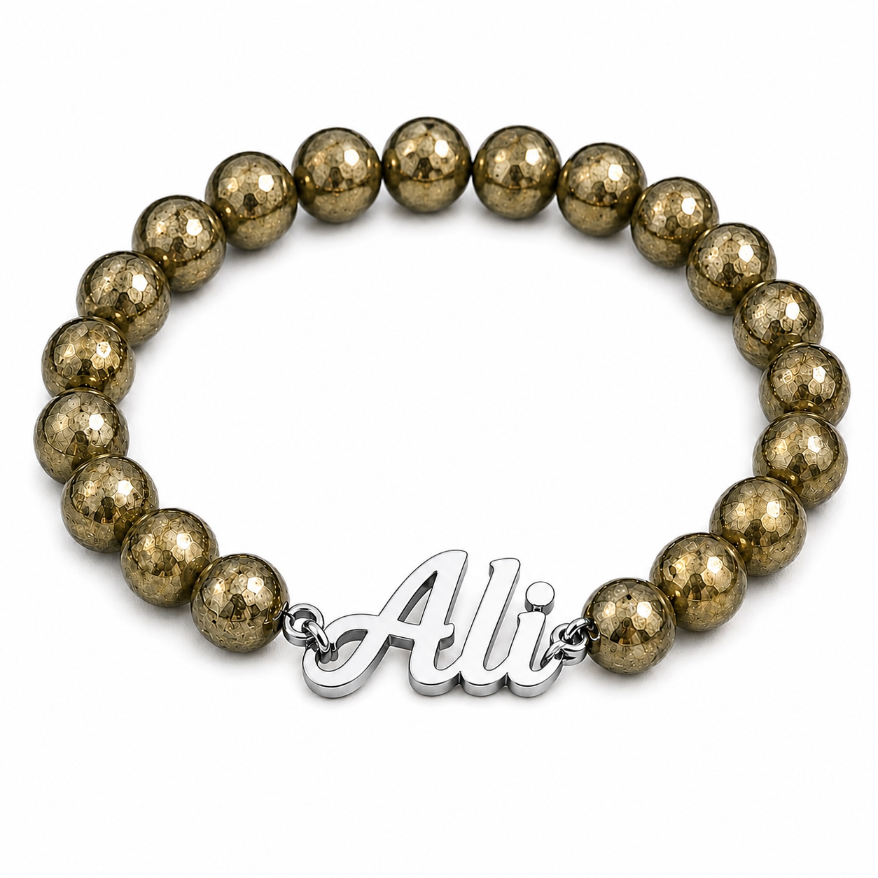Bracelet with gold beads and a silver 'Ali' charm on a white background