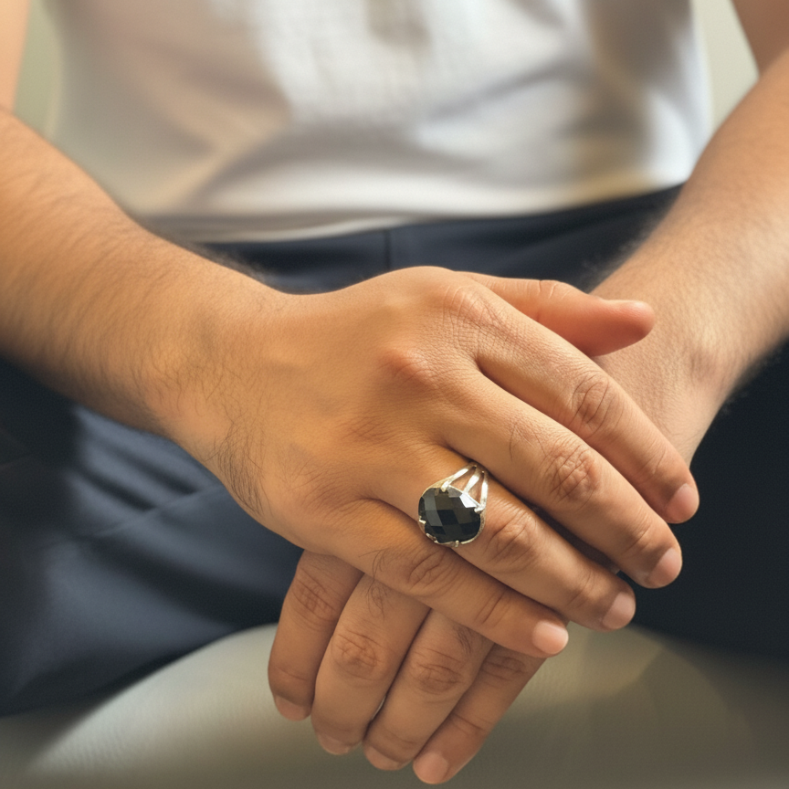 Close-up of hands with a ring, blurred background