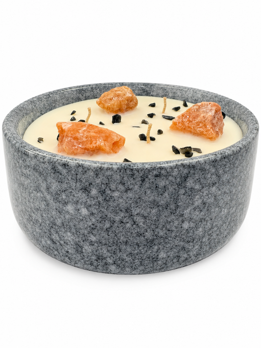 Gray stone bowl with a dessert on a white background