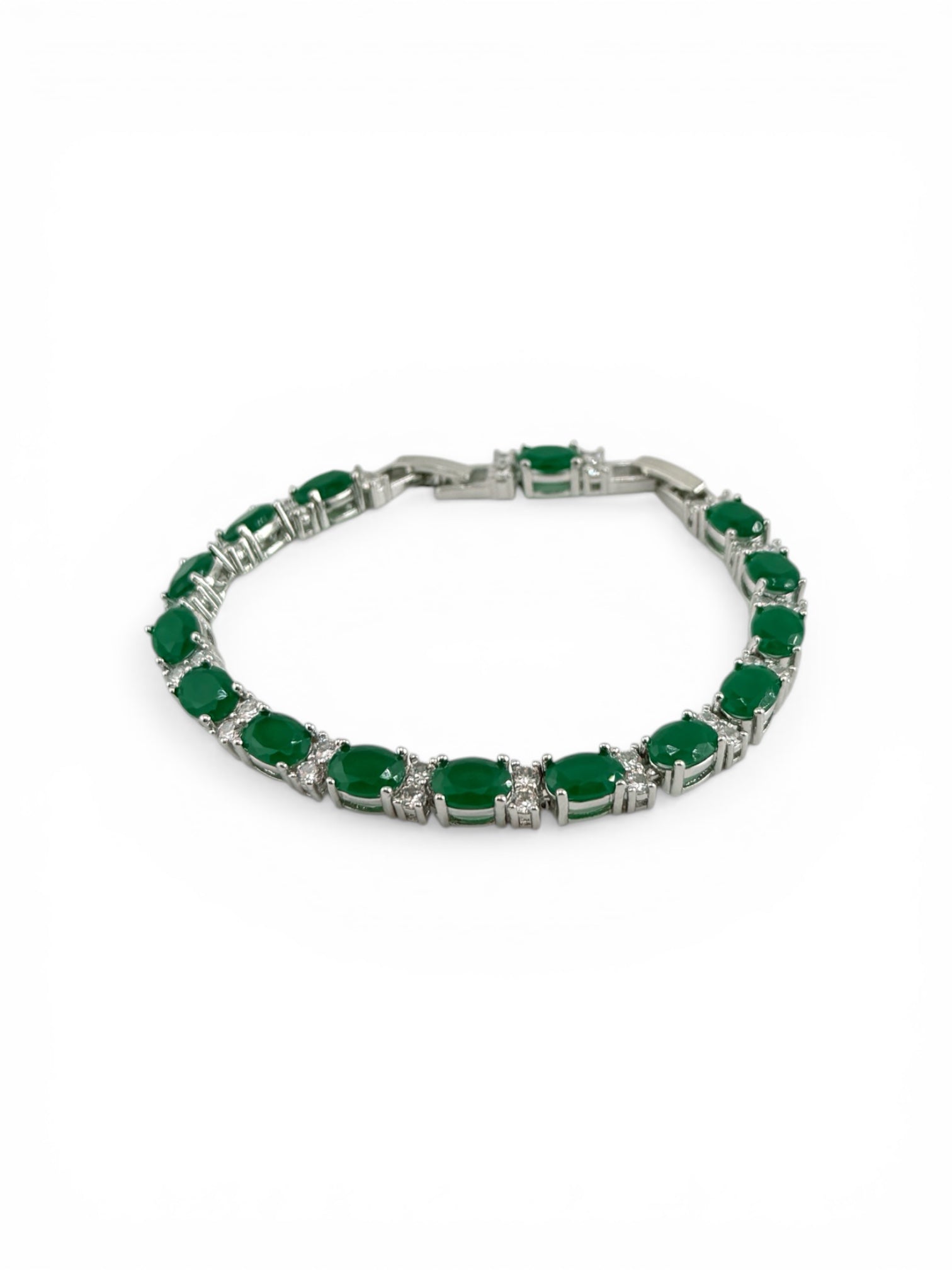 Green gemstone bracelet with silver band on a white background