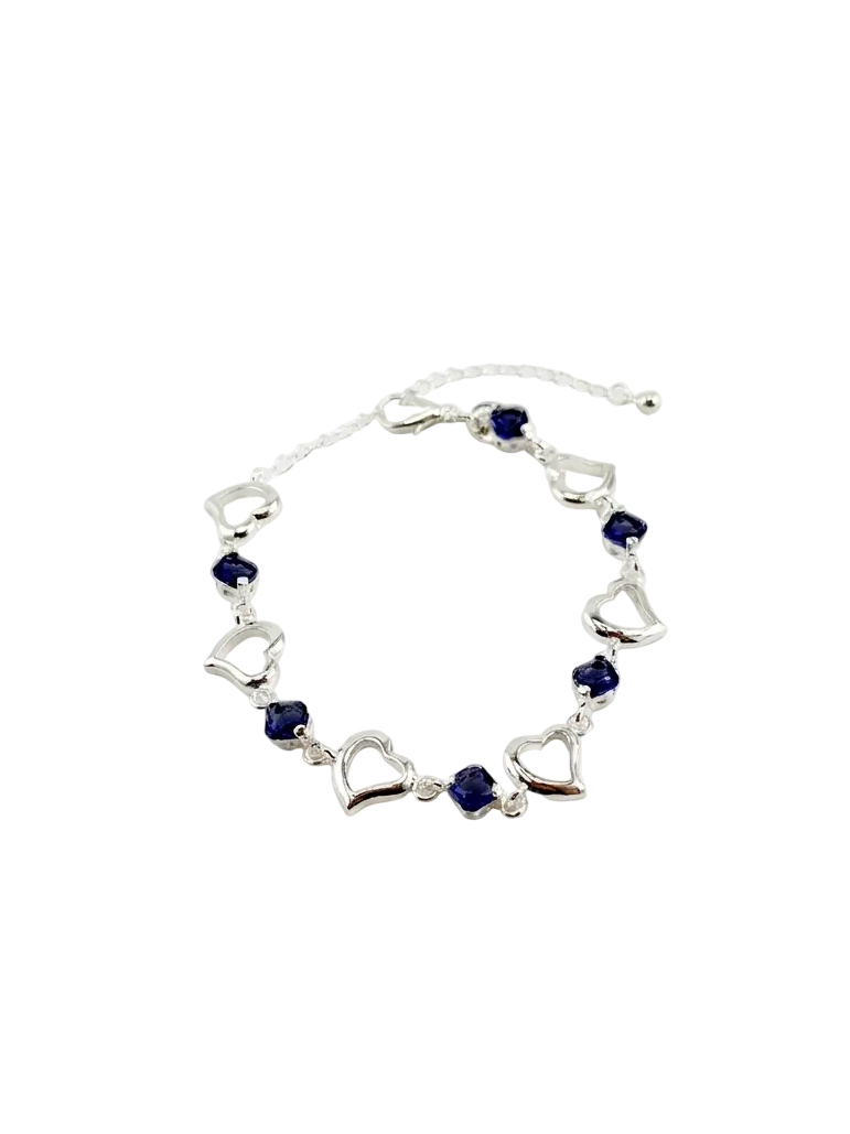 Bracelet with heart-shaped charms and blue beads on a white background