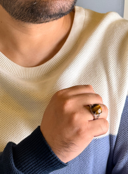 Man wearing natural Tiger Eye male ring with silver finish
